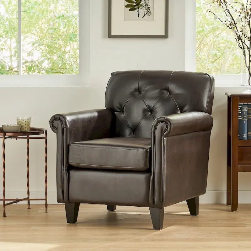 Fauteuil club en cuir marron capitonné