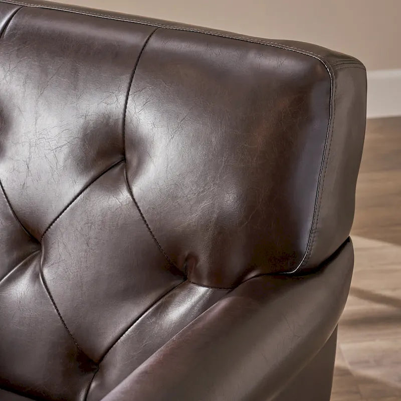 Fauteuil club en cuir marron capitonné