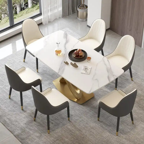 Table de salle à manger contemporaine en marbre avec base géométrique dorée