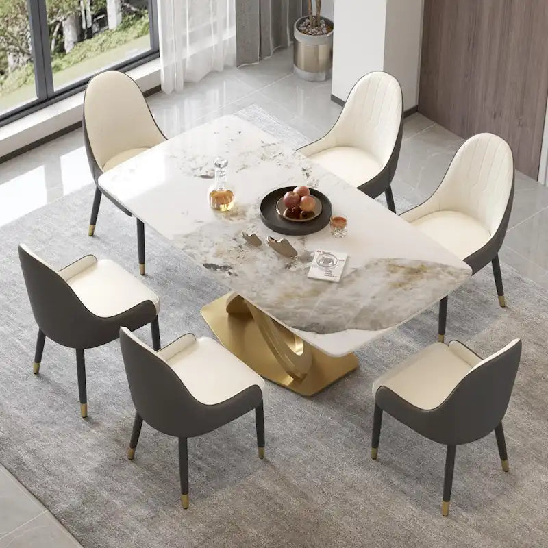Table de salle à manger contemporaine en marbre avec base géométrique dorée