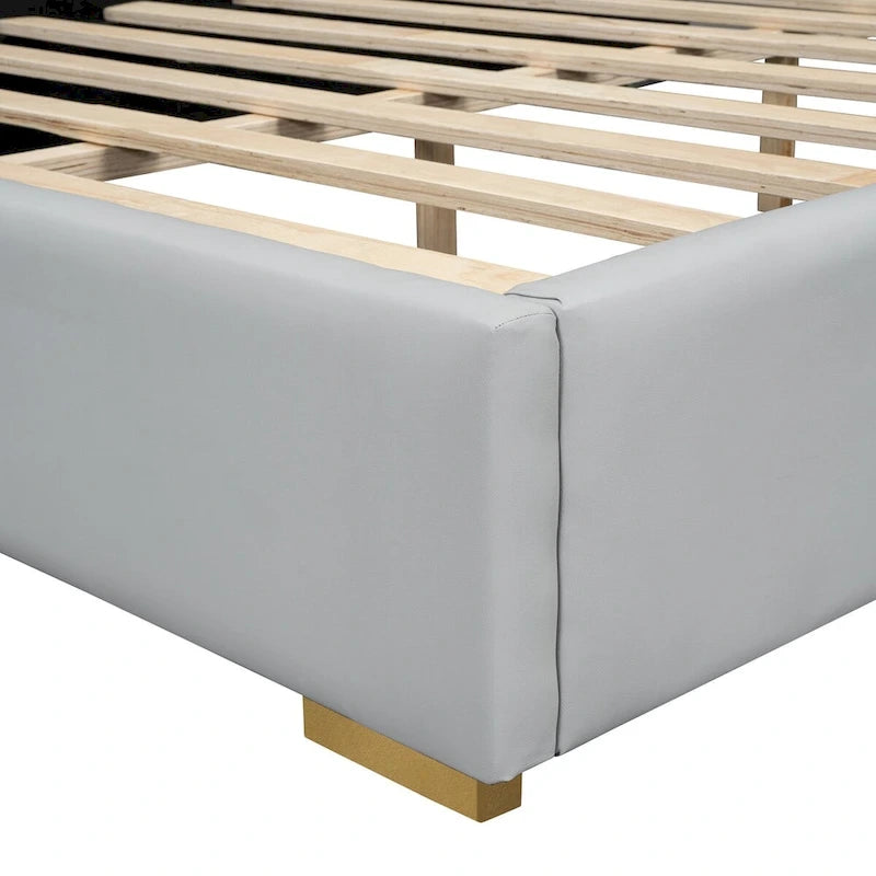 Lit plateforme deux places en similicuir avec bandes métalliques