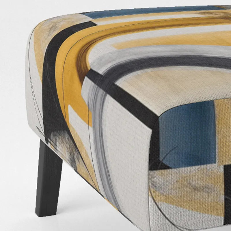 Chaise/fauteuil décoratif rembourré de style moderne dans une palette de couleurs or et noir.