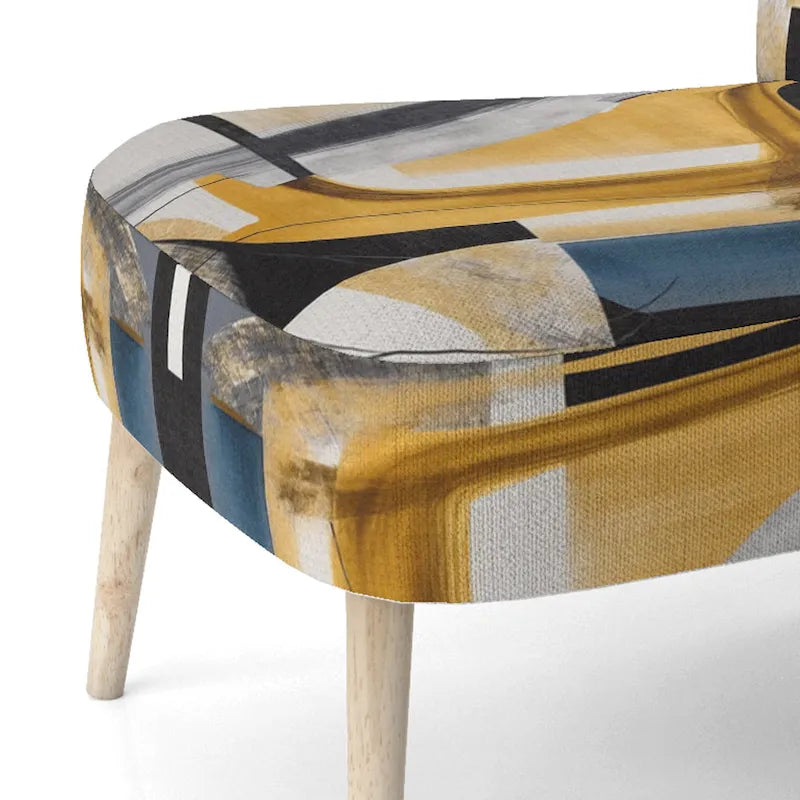 Chaise/fauteuil décoratif rembourré de style moderne dans une palette de couleurs or et noir.