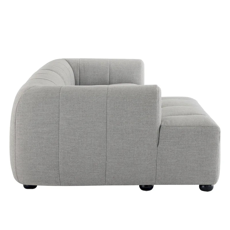 Canapé en tissu capitonné avec méridienne