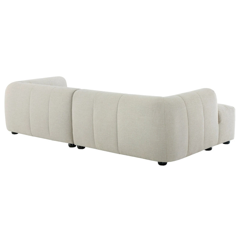 Canapé en tissu capitonné avec méridienne